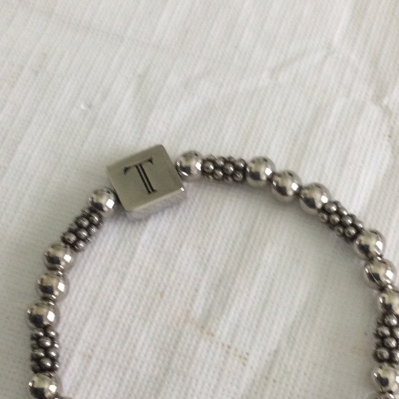 Woman’s Beaded Stretch Bracelet or key Chain color sliver has charm of a heart - Picture 3 of 5